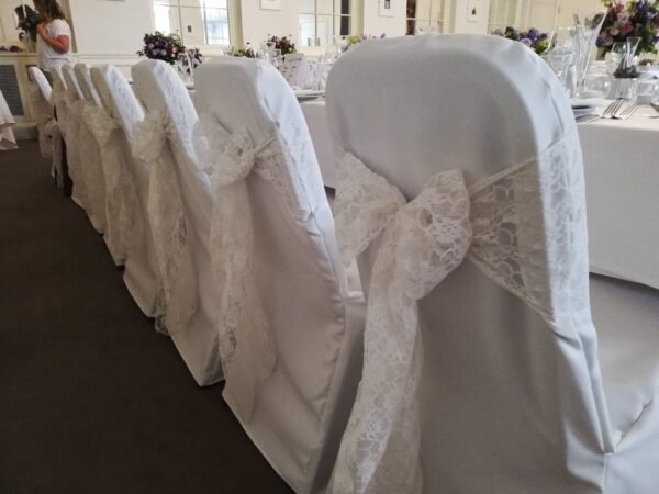 White lace chair sashes