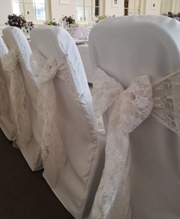 White lace chair sashes